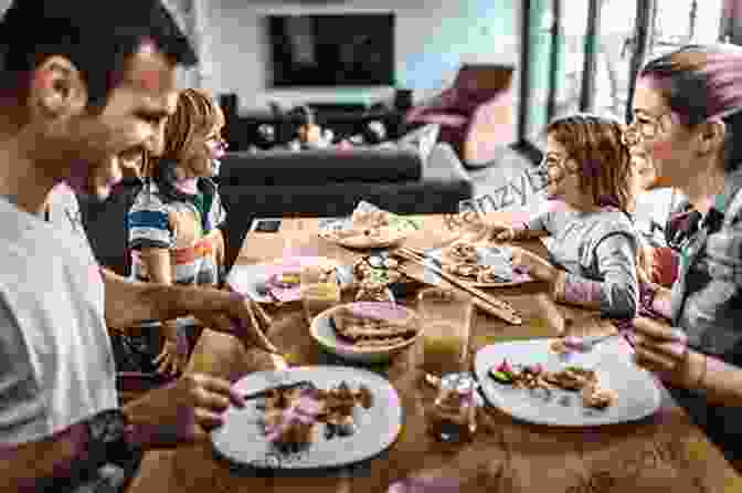 A Family Enjoying A Meal Together At A Dinner Table. 365 Unique American Recipes: An American Cookbook For All Generation