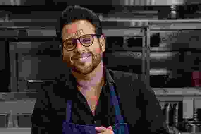 A Headshot Of Chef Scott Conant, Smiling And Holding A Pawpaw. The Pocket Pawpaw Cookbook Scott Conant