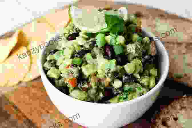A Hearty And Protein Packed Bowl Of Black Bean Guacamole With Visible Black Beans. Collection Of The Yummiest Guacamole Recipes: The Best Dips Straight From Avocado Heaven