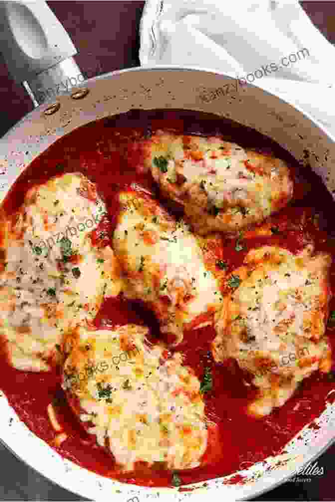 A Juicy Chicken Cutlet Topped With Melted Mozzarella Cheese And Tomato Sauce Pressure Cooker Cookbook: 370 Irresistible Quick And Easy Recipes For Everyone