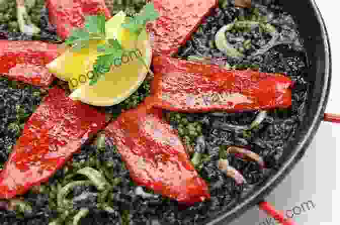 A Plate Of Arròs Negre, With Its Distinctive Black Color From Squid Ink La Paella: Deliciously Authentic Rice Dishes From Spain S Mediterranean Coast