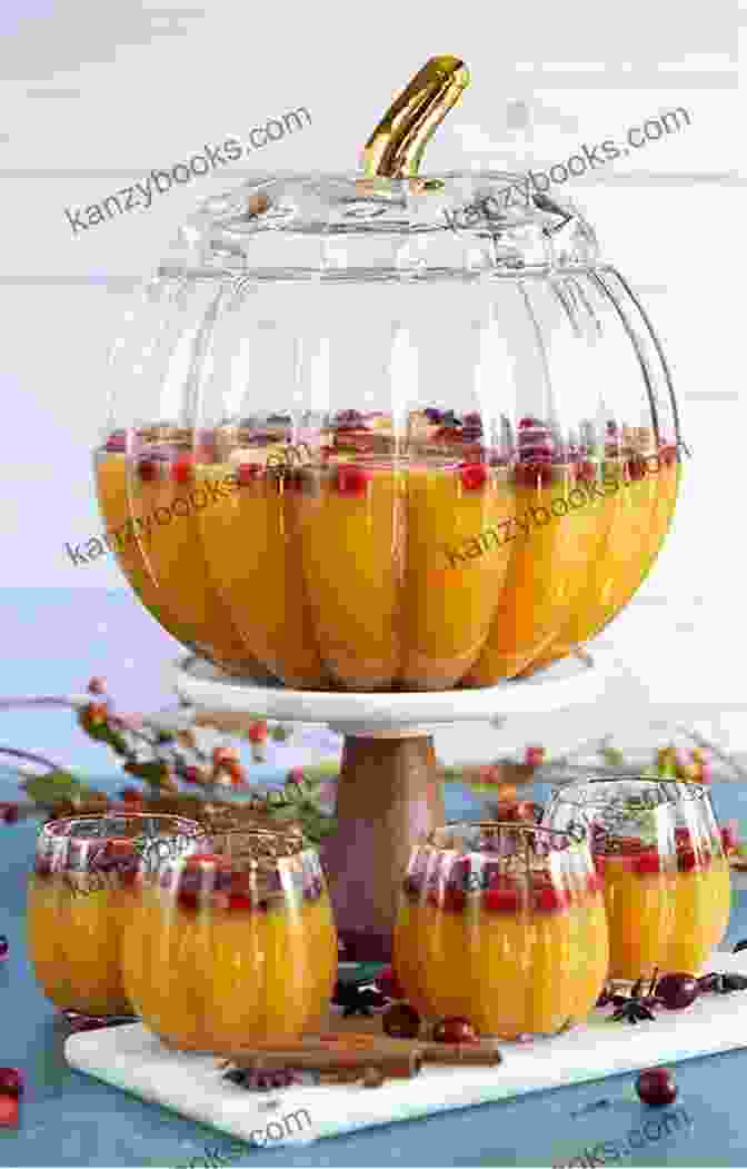 A Punch Bowl Filled With Orange Liquid And Garnished With Cinnamon Sticks And Pumpkin Slices Wild Brews For All Hallows: 13+ Natural And Herbal Recipes For Spooky Halloween Drinks Punch Bowls And Party Potions (Wild Brews Herbal Series)