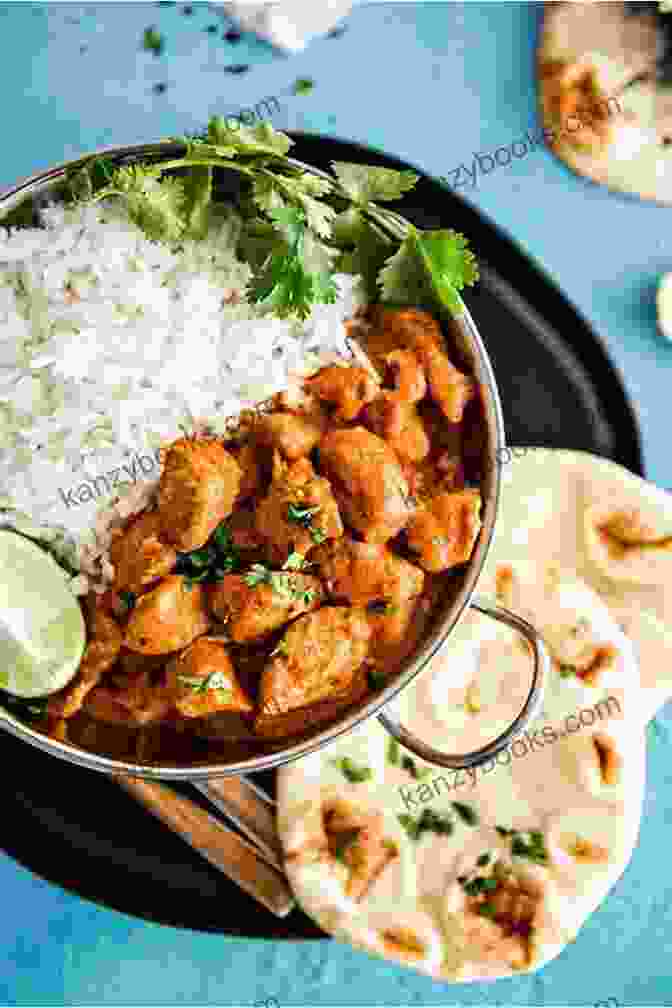 A Sizzling Plate Of Butter Chicken, Served With Fragrant Basmati Rice. The Best Of Indian Instant Pot Cookbook Authentic Flavors And Modern Recipes For Your Electric Pressure Cooker