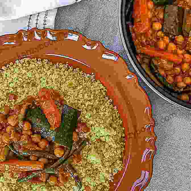 A Steaming Bowl Of Algerian Couscous With Vegetables And Meat Healthy Algerian Cuisine Recipes: Famous Algerian Dishes And Authentic Recipes: Cuisine Of Algerian