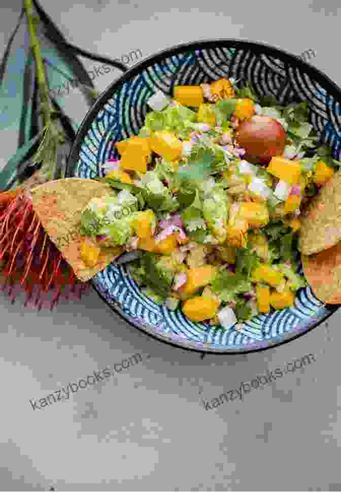 A Tropical And Refreshing Bowl Of Mango Guacamole With Visible Mango Chunks. Collection Of The Yummiest Guacamole Recipes: The Best Dips Straight From Avocado Heaven