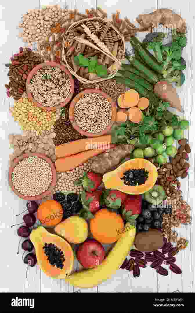 A Variety Of Fresh Fruits, Vegetables, And Whole Grains On A Wooden Table. The Simply Real Health Cookbook: Easy Real Food Recipes For A Healthy Life Made Simple