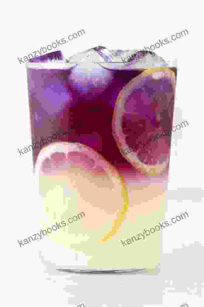 A Vibrant Blue Butterfly Pea Lemonade Garnished With Edible Flowers The Perfect Lemonade Cookbook For You: Collection Of Refreshing Lemonade Recipes That Will Amaze Everyone