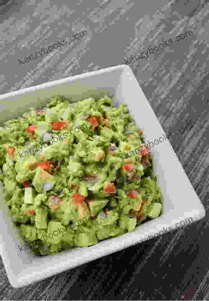 A Vibrant Green Bowl Of Classic Guacamole With A Rustic Texture. Collection Of The Yummiest Guacamole Recipes: The Best Dips Straight From Avocado Heaven