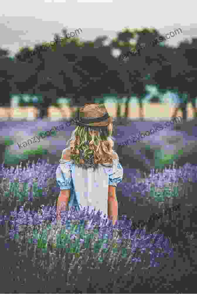 A Woman Standing In A Field Of Lavender, Looking Up At The Sky JAN A Breath Of French Air