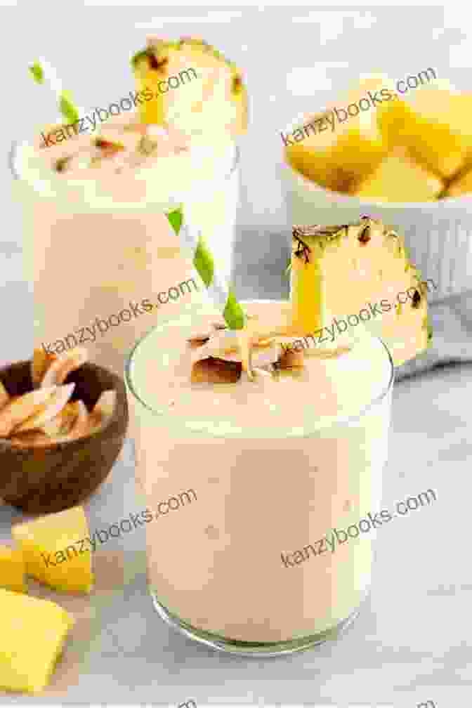 Creamy Yellow Smoothie With Pineapple Chunks And Umbrella Garnish Smoothie Recipes For Beginners: Delicious Smoothie Recipes For Losing Weight Feeling Great And Improving Your Health