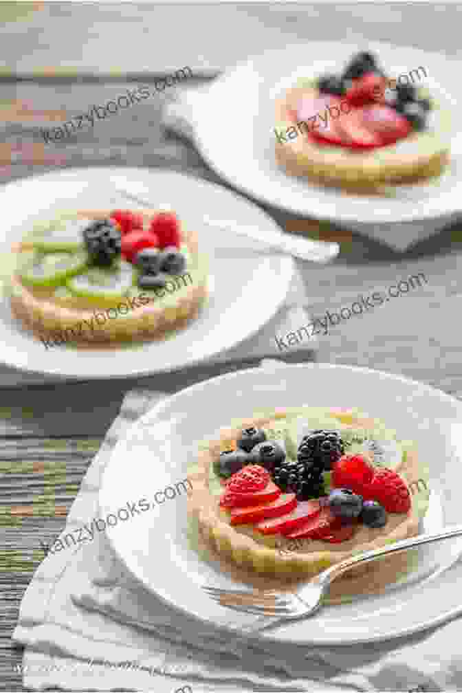 Mini Fruit Tarts With Various Fruit Fillings And Fresh Berries Easy Appetizers: 25 Delicious Appetizer Recipes Your Family Will Love